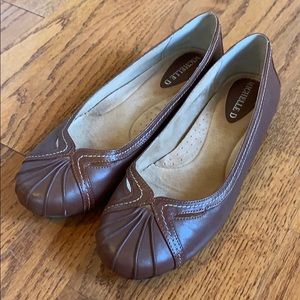 Brown leather flats